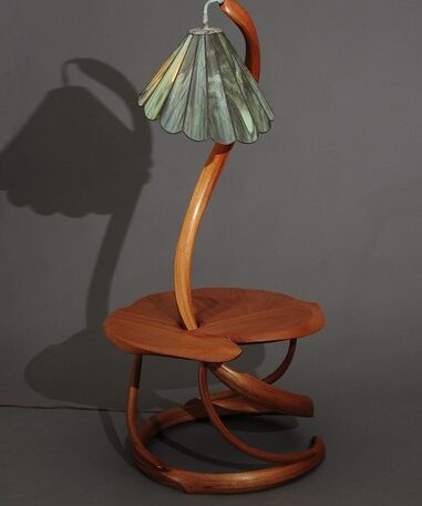 "Blown Away: A Table and Stained glass Lamp in One"